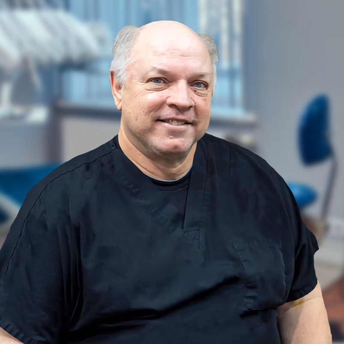 Barry Lejeune sitting in a dental treatment room