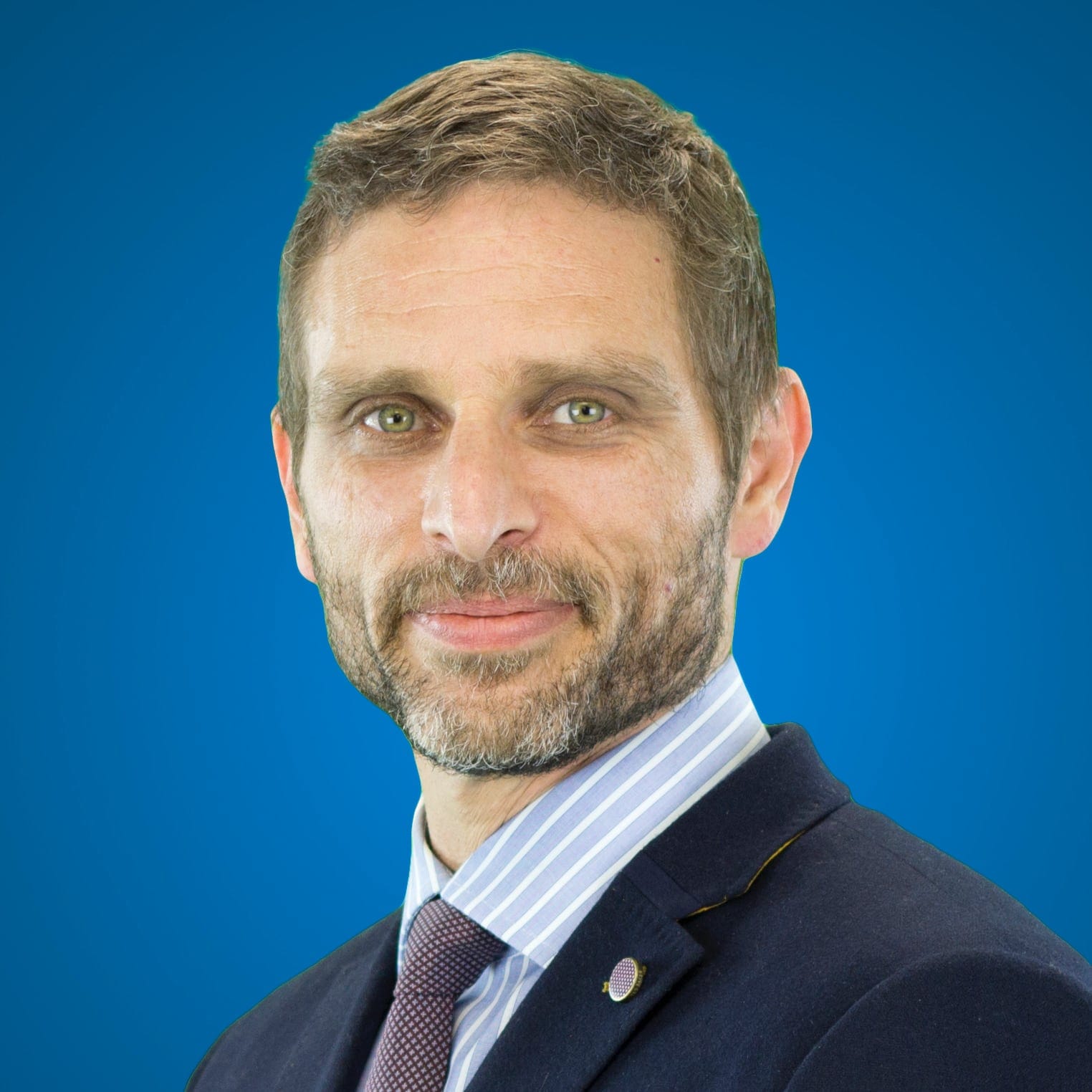 Jeffrey Blumberg headshot photo, in a suit