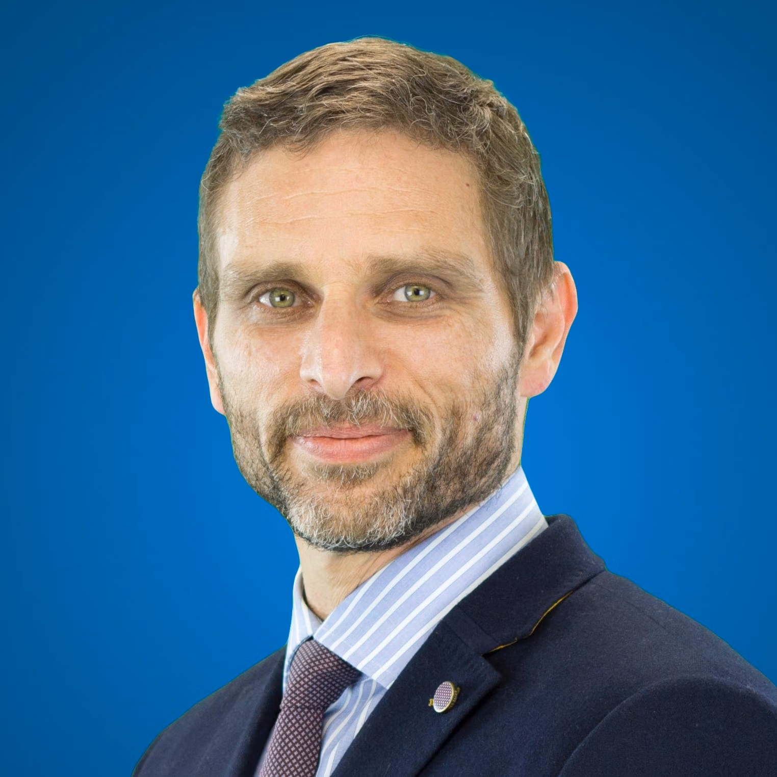 Jeffrey Blumberg headshot photo, in a suit
